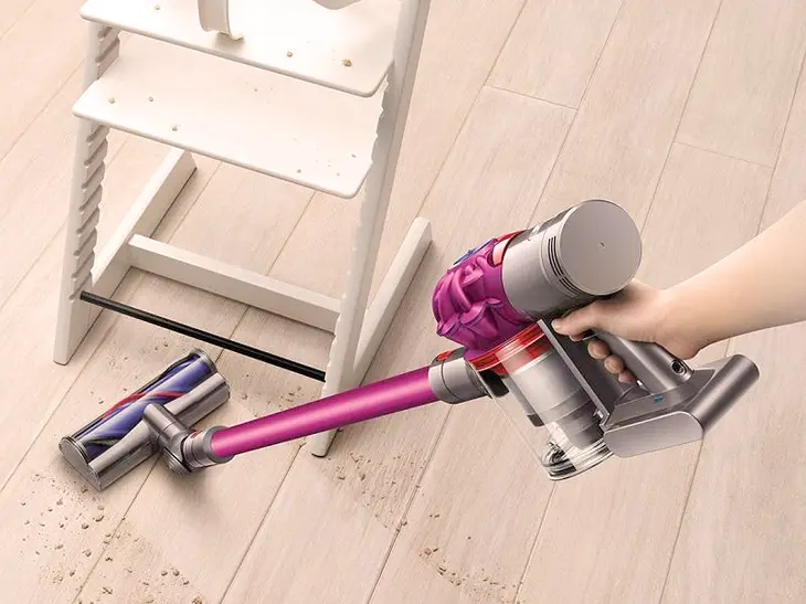 A close-up photo of a steam cleaner releasing steam to sanitize indoor surfaces, emphasizing its natural and chemical-free cleaning method.